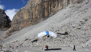 Successful landing after base jumping the 600m high east wall of the 5100m high Pan de Azucar